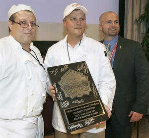 Three Men and A Plaque Award
